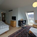 Soveværelse med loungeområde